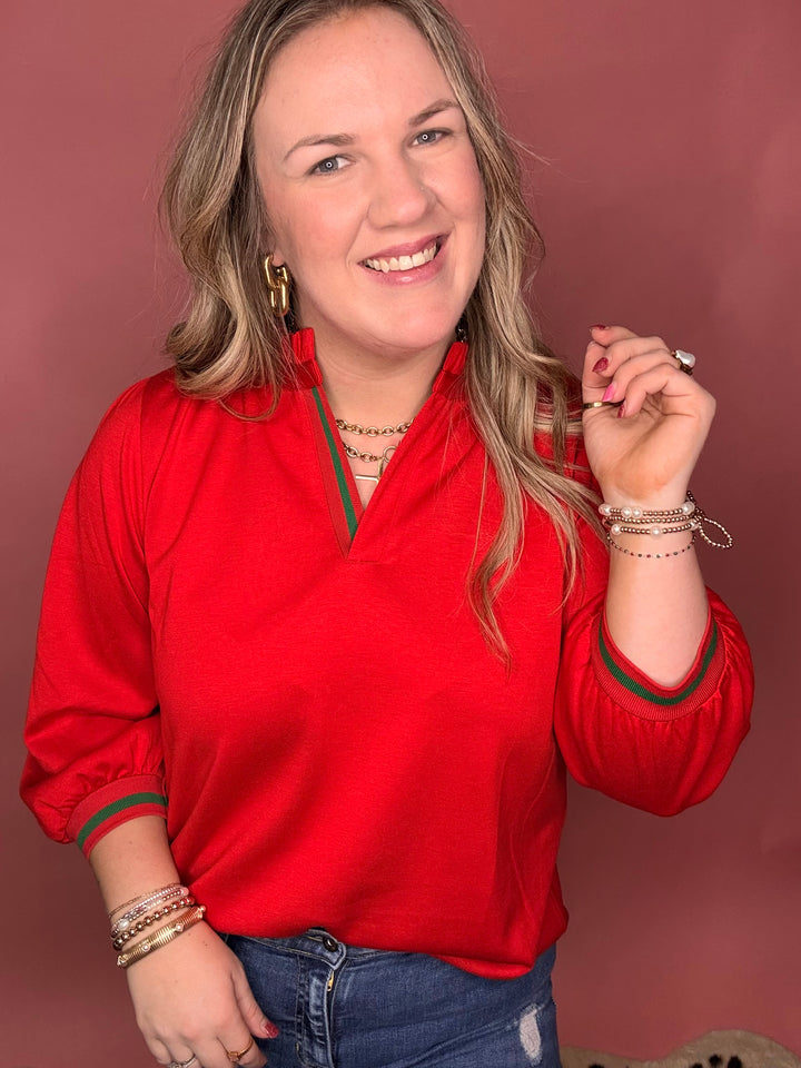 Red Blouse with Green Stripe Detail