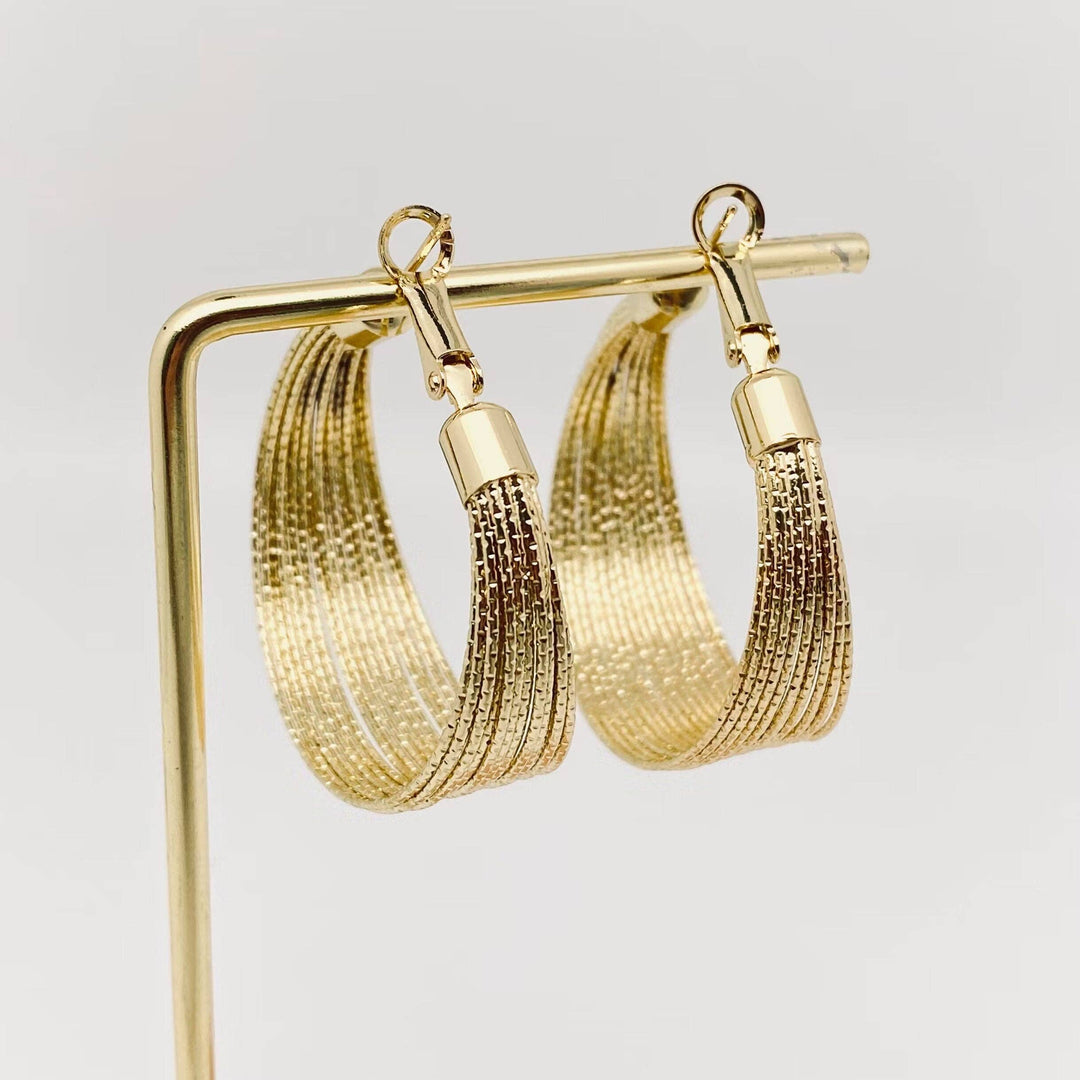 Golden Coil Hoop Earring