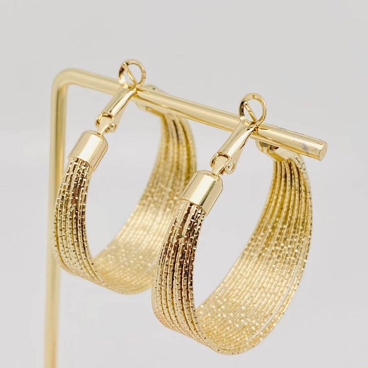 Golden Coil Hoop Earring